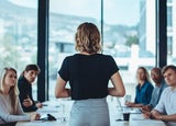 Female business leader conducting a meeting