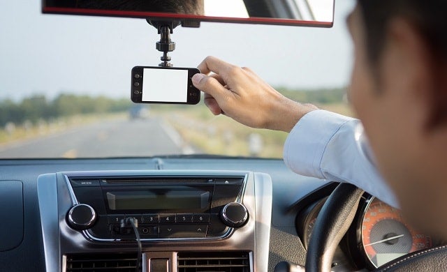 Man using dash cam 