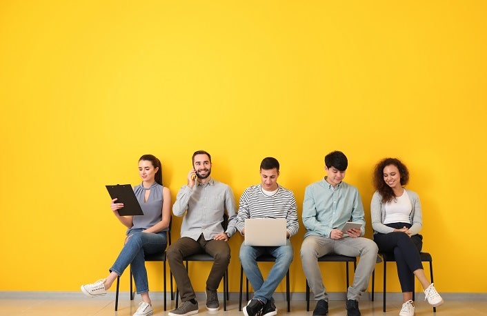 Young people waiting for job interview indoors