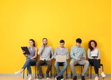 Young people waiting for job interview indoors